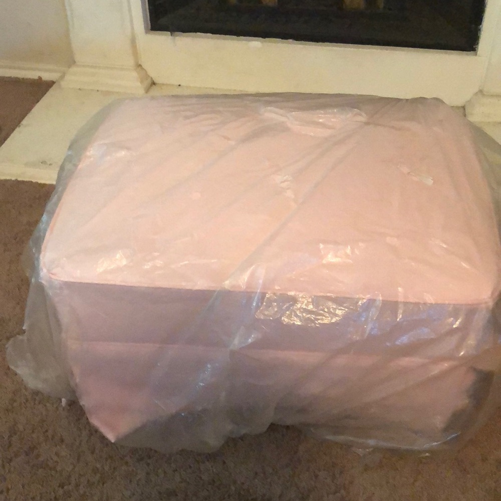 Pink rocking footstool